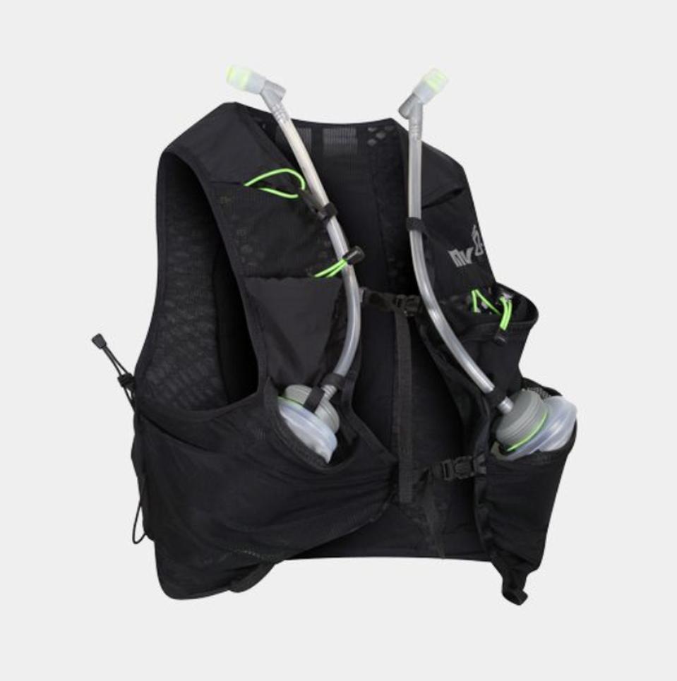 black running hydration vest and backpack with green accents on a grey background