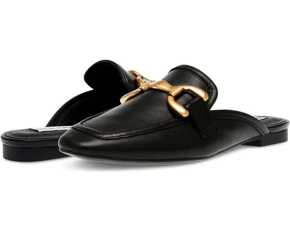 Pair of women's Steve Madden Fortunate Bit Mules in black.