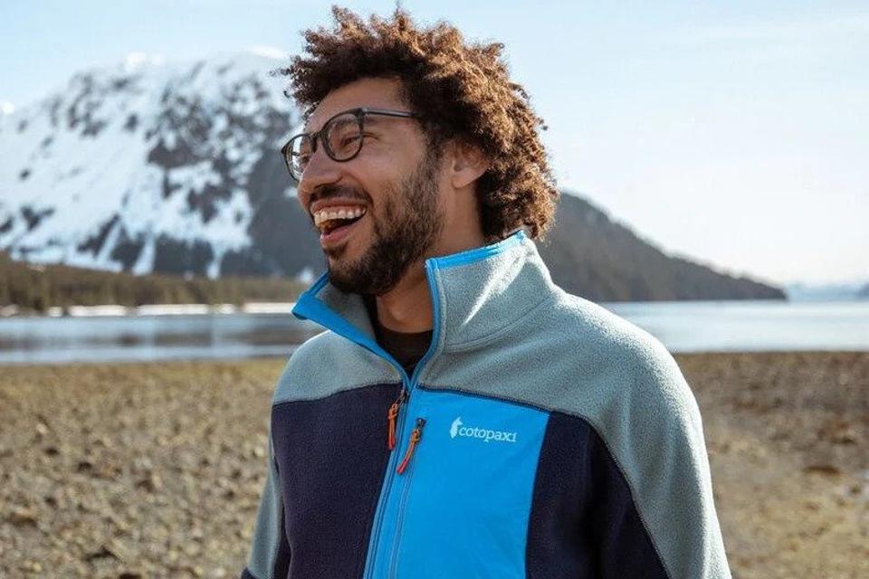 a man stands in a Cotopaxi fleece