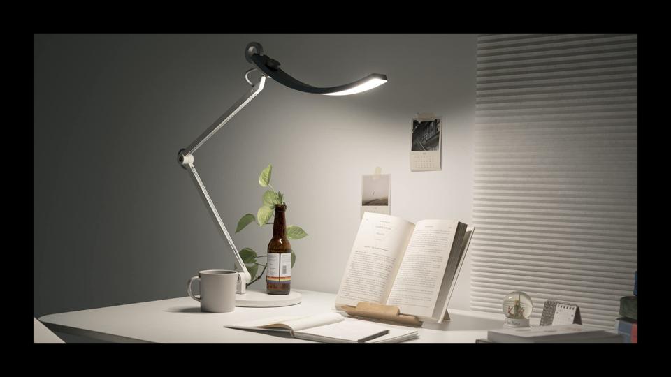 A Ben-Q desk lamp featured on a desk