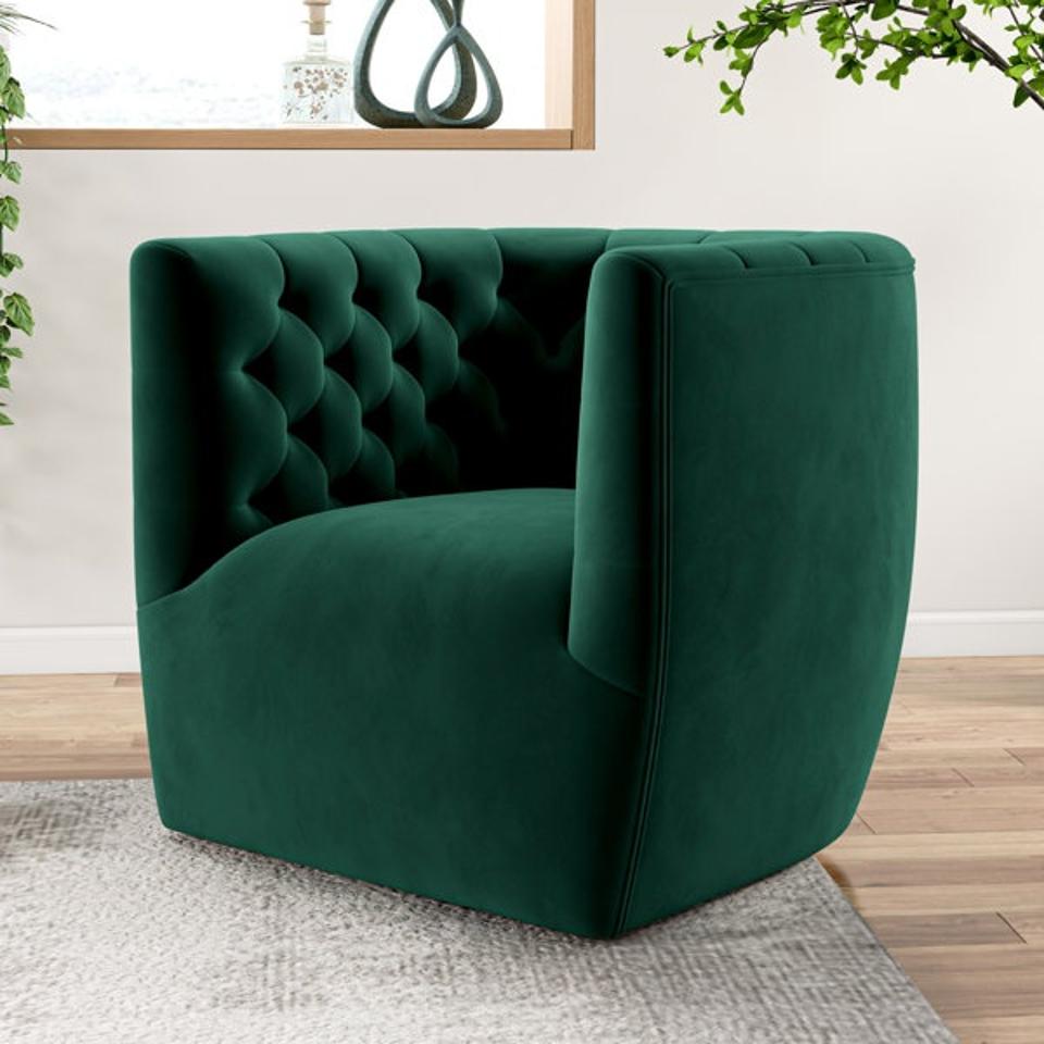 Quinton Velvet Swivel Barrel Chair in a living room.