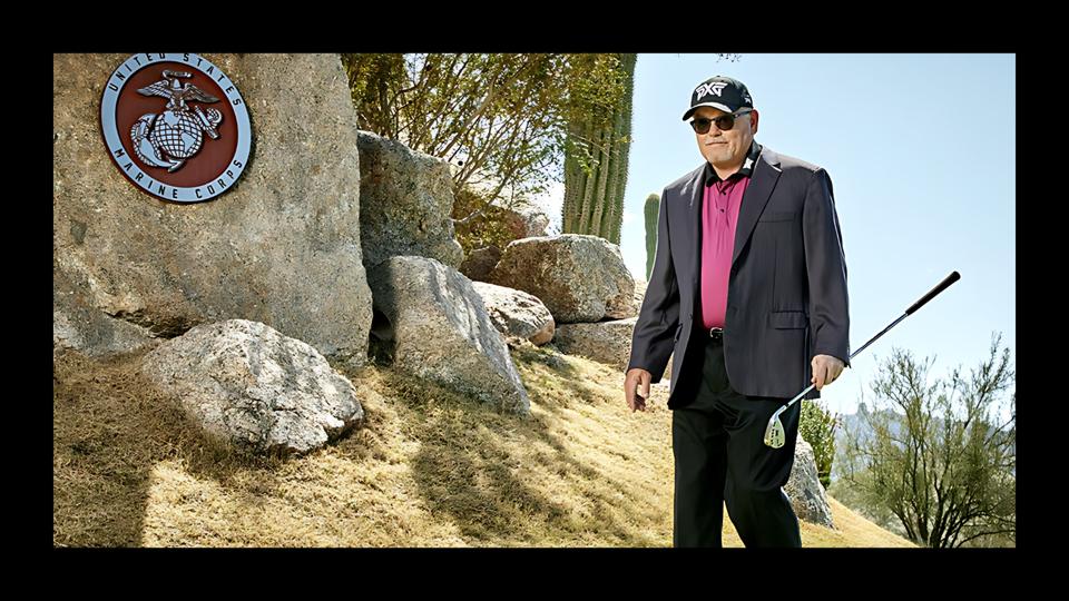 PXG founder Bob Parsons walking on a golf course