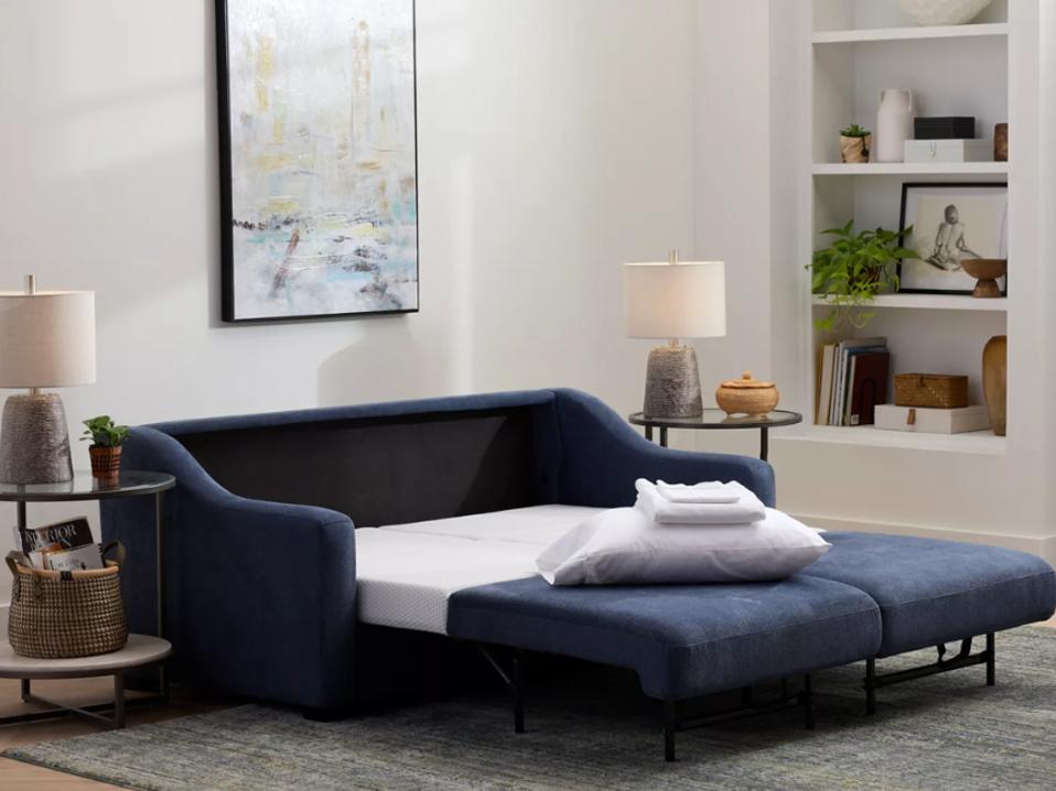 babble indico fabric american leather alora sleeper sofa pulled out in living room in day