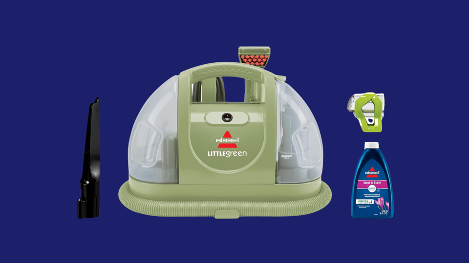 The Bissell Little Green Cleaner next to a cleaning solution against a blue background.