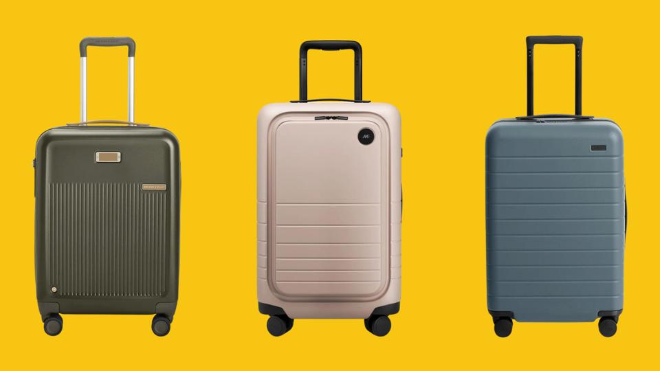 Three hardside suitcases against a bright yellow background