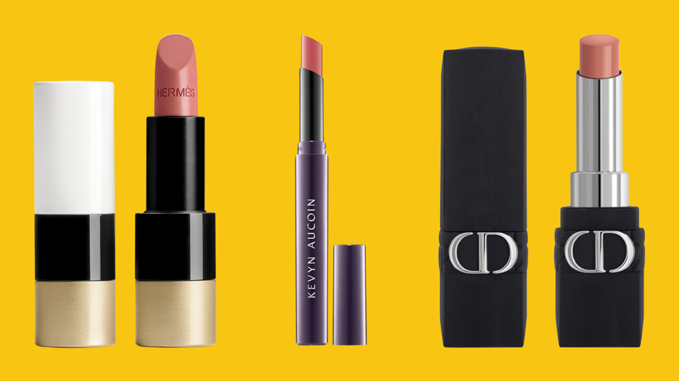 Three nude lipsticks on a yellow background.