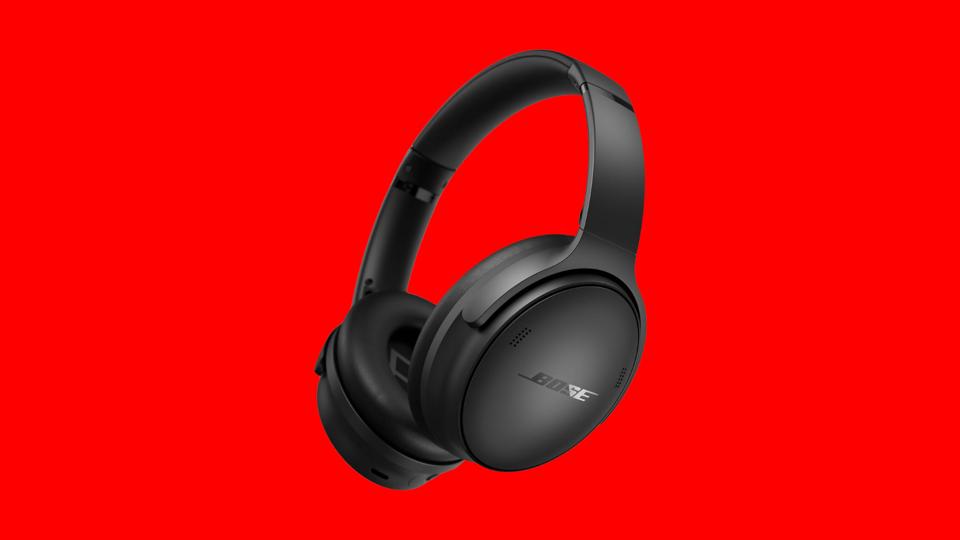 The Bose QuietComfort Wireless Headphones on a red background.