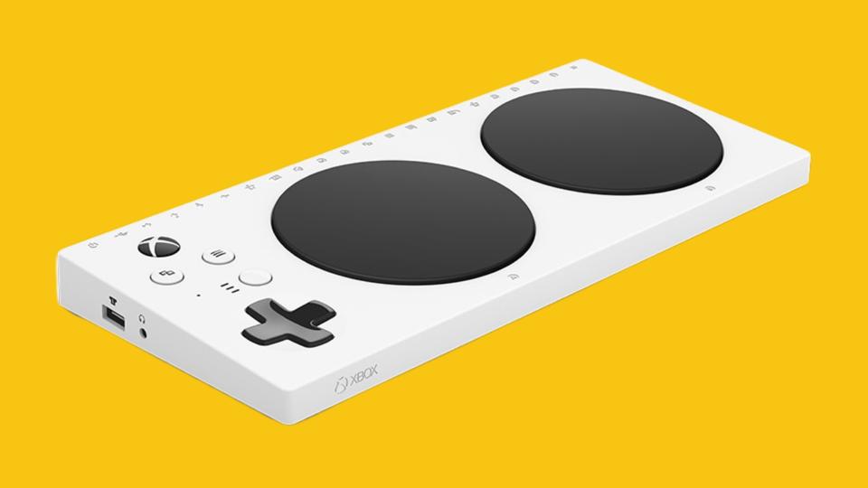 A photo of the Xbox Adaptive Controller on an illustrative yellow background