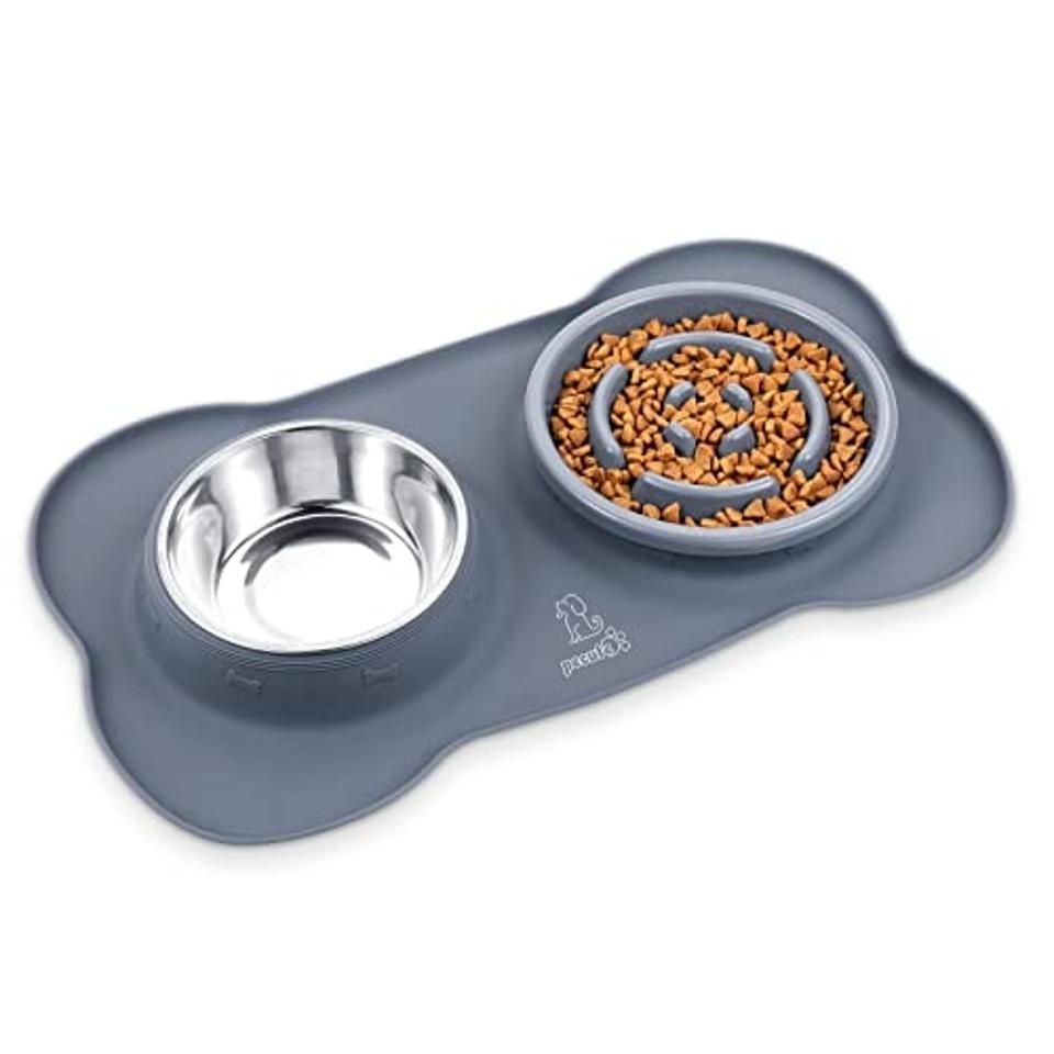 The Pecute Slow Feeder Dog Bowl and a water bowl inside a gray silicone mat