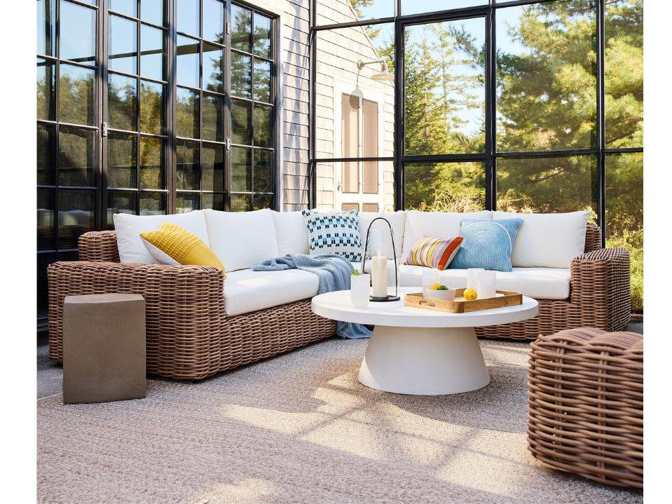 West Elm Westport 3-Piece L-Shaped Sectional in a sunroom with colorful pillows