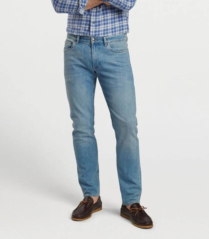 Peter Millar Vintage Washed Five-Pocket Denim on a male figure