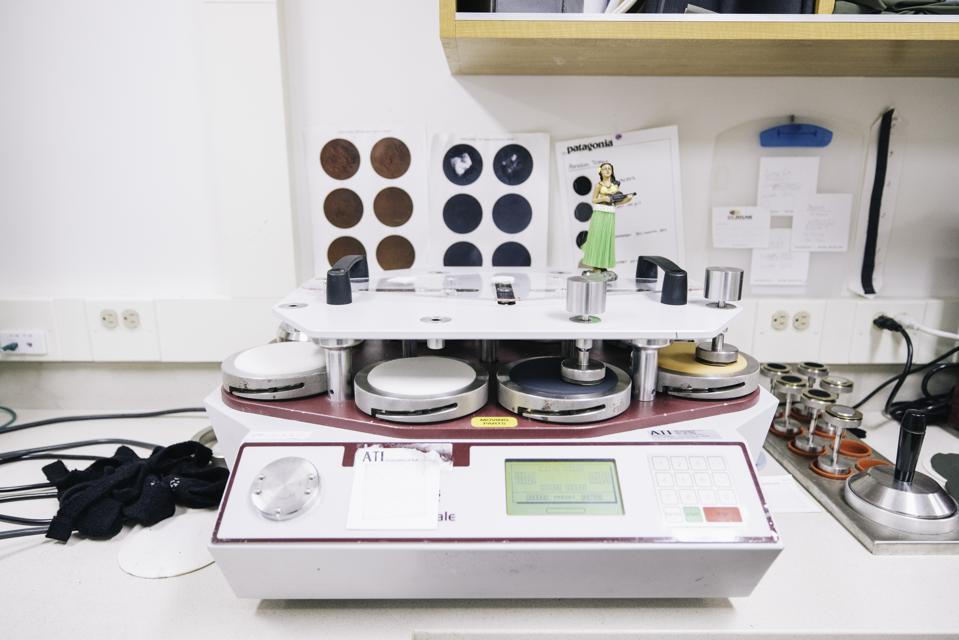 A machine in a laboratory that simulates wear on fabrics