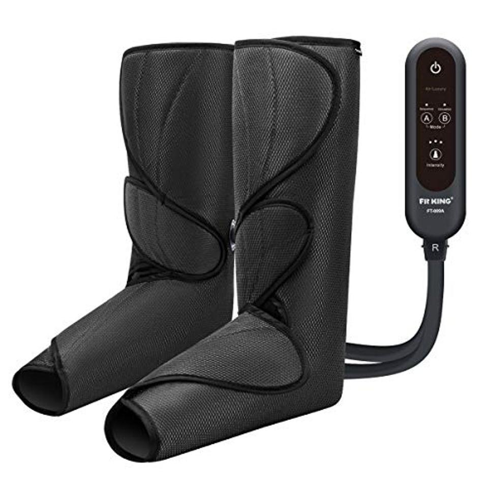 foot and calf massager, black and grey with a remote on a grey background