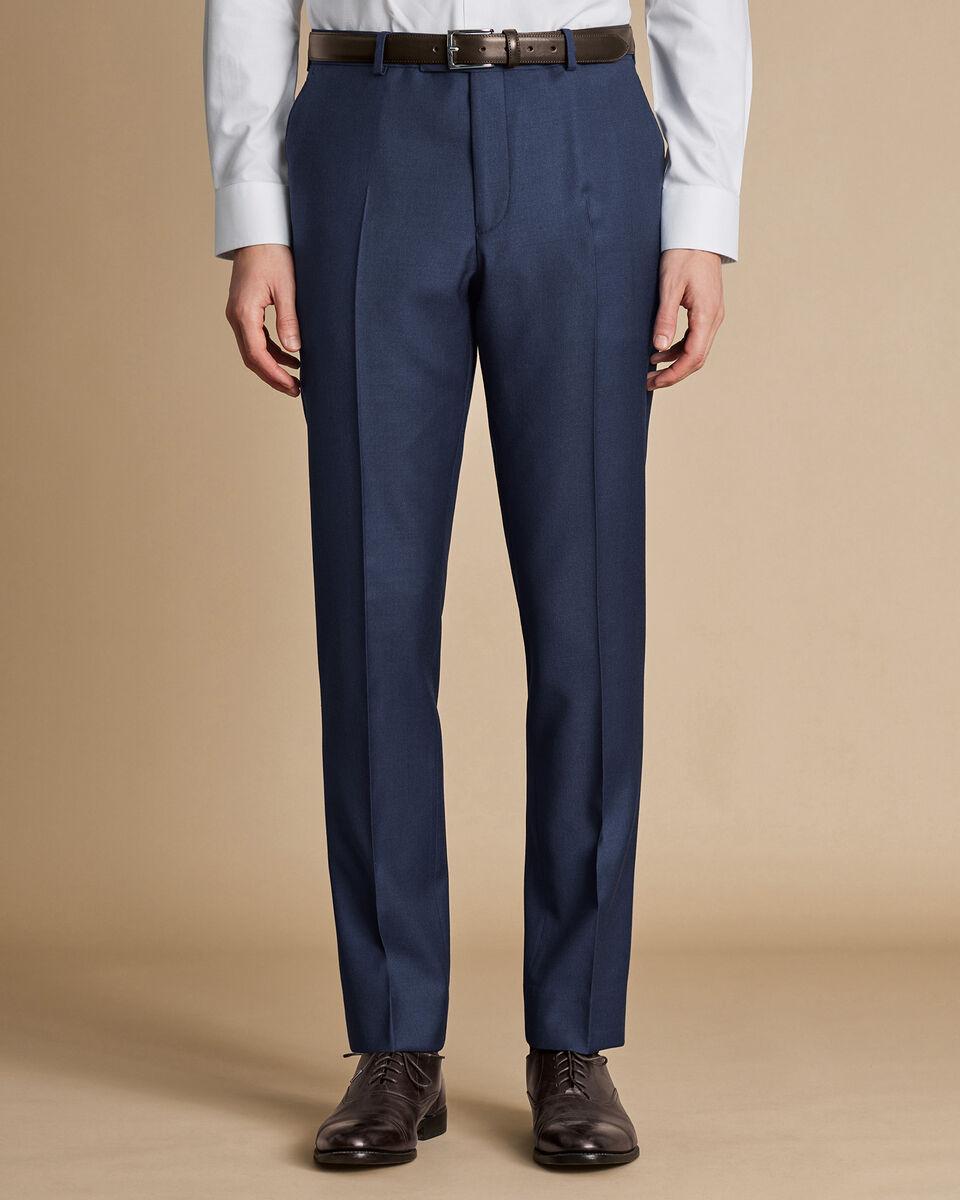 Charles Tyrwhitt Natural Stretch Twill Suit Pants on a male figure