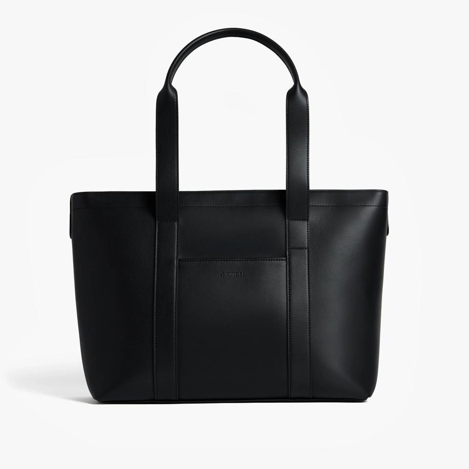 Black tote against a white background.