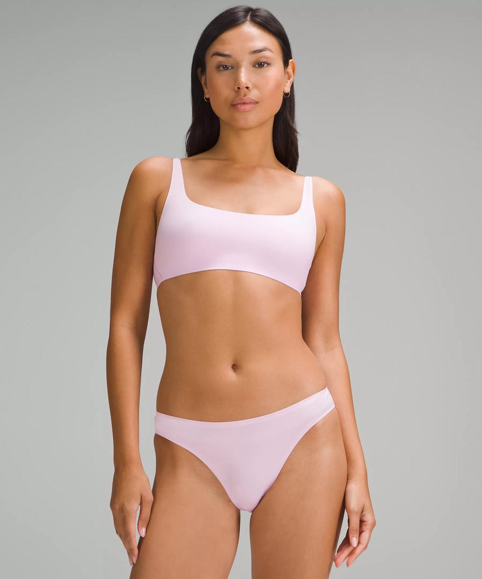 Woman wearing Lululemon Wundermost Ultra-Soft Nulu Scoop-Neck Bralette in Vitapink