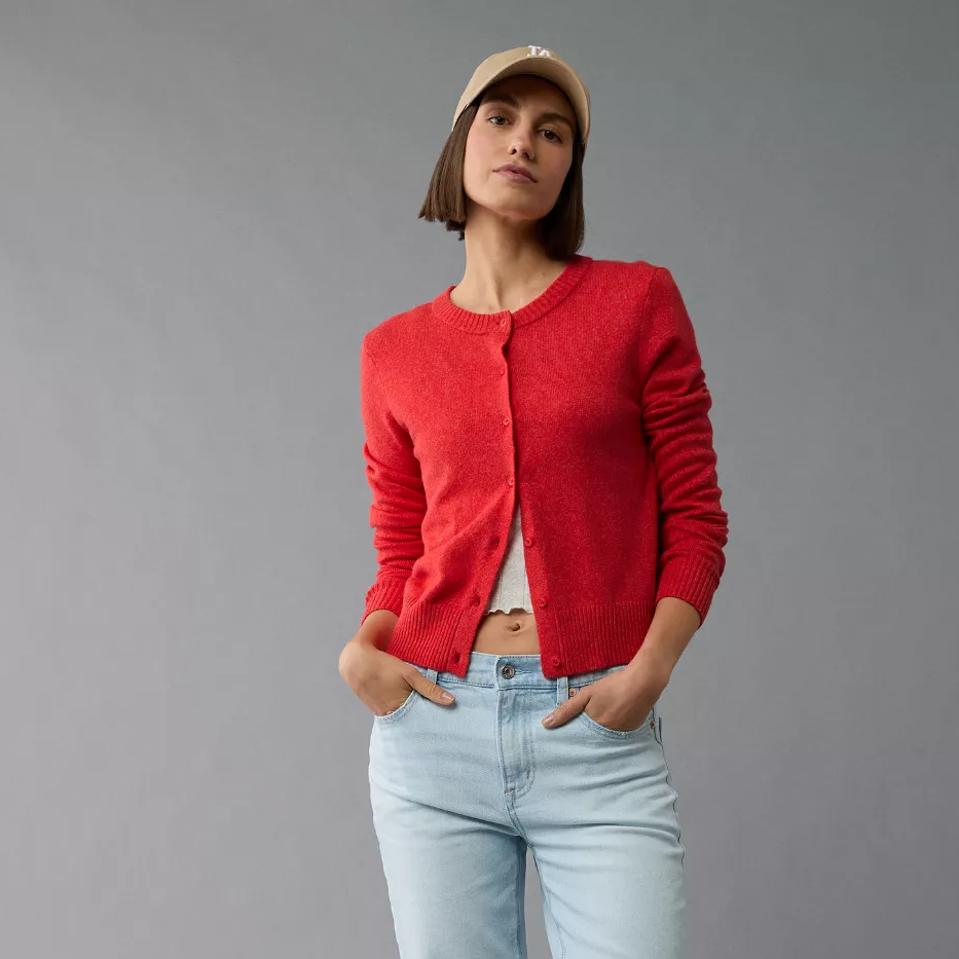 Woman wearing American Eagle AE Crew Neck Lady Cardigan in Cherry