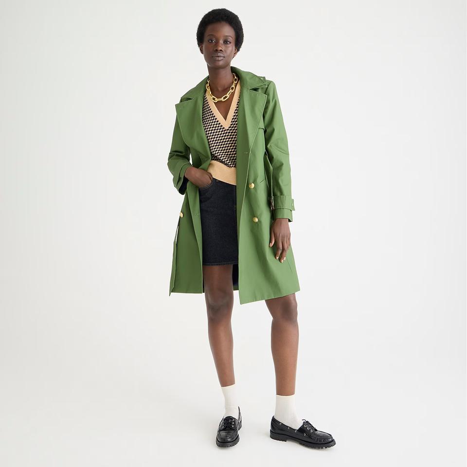 Woman wearing J.Crew New Icon trench in Utility Green