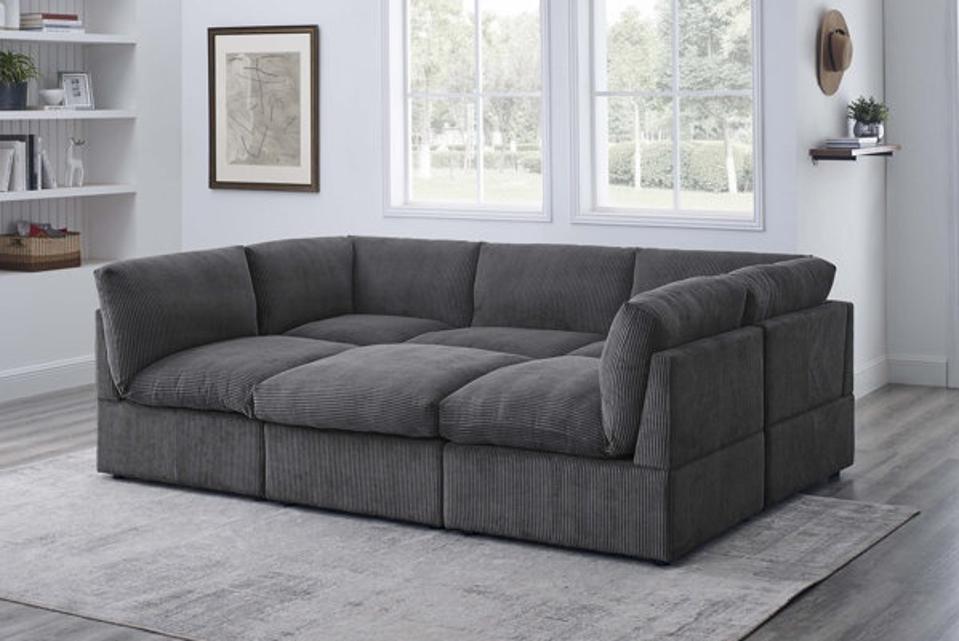 Latitude Run Priyen 98" Modular Corner Sectional in a living room