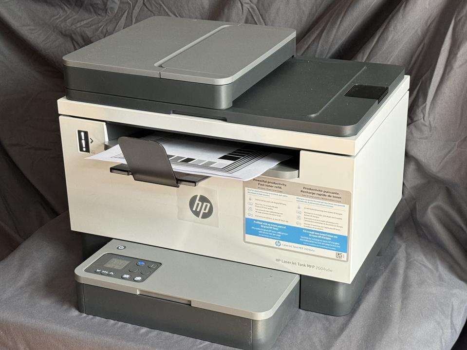 The HP LaserJet Tank MFP 2604SDW Printer on a table