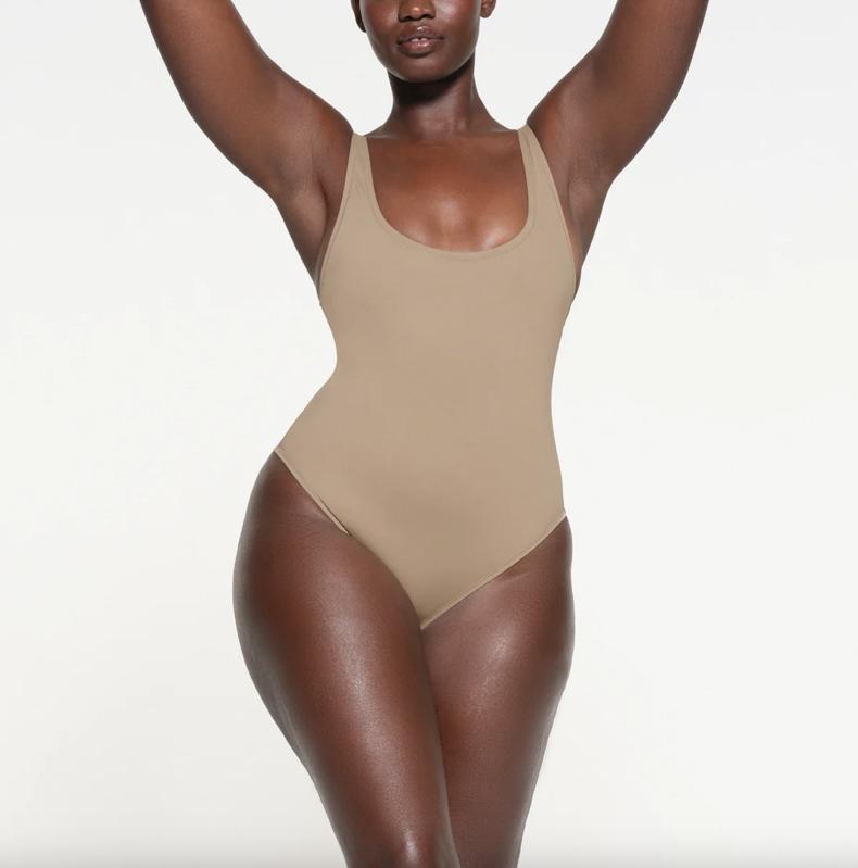 Skims Scoop Neck One-Piece on a female figure against a white background