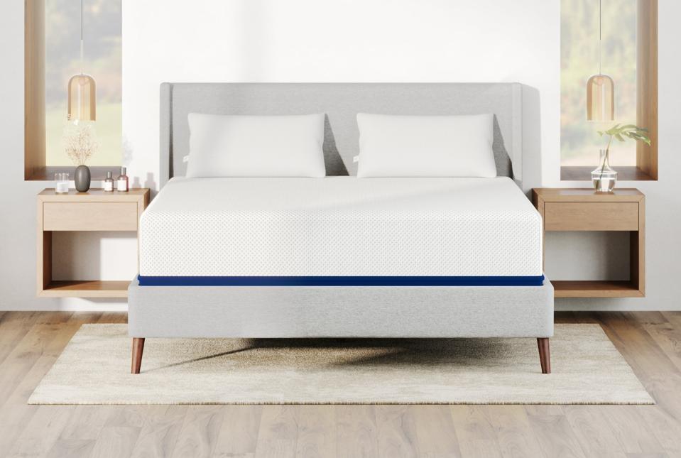 Lifestyle image of the Amerisleep AS5 Mattress in a light bedroom.