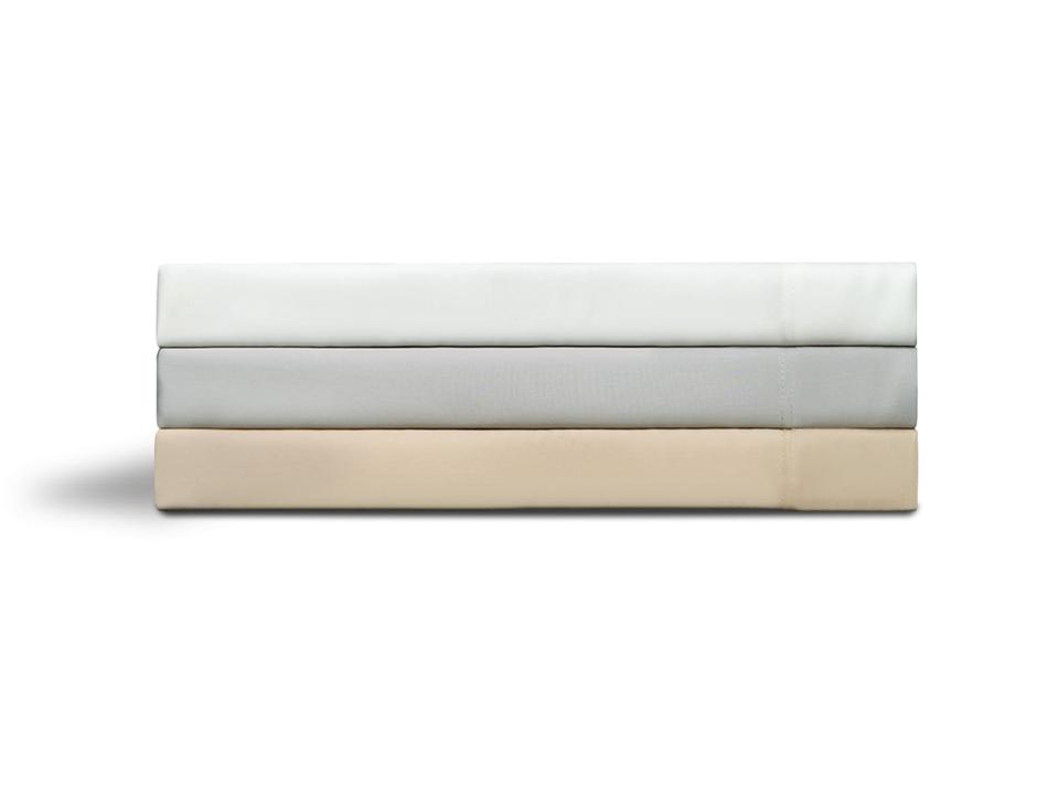 The Helix Tencel Sheet Set in white, silver and khaki stacked on a white background