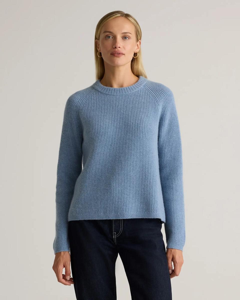 Woman wearing Quince Mongolian Cashmere Fisherman Crewneck Sweater in Faded Denim