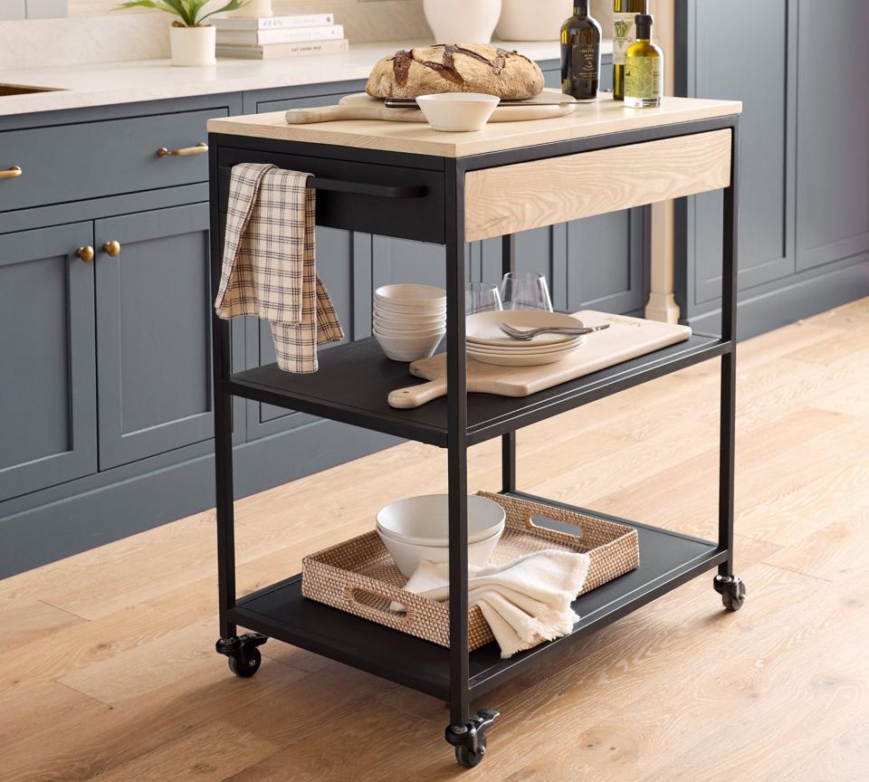 The Hold Everything Kitchen Cart in a gray kitchen with a loaf of bread on top