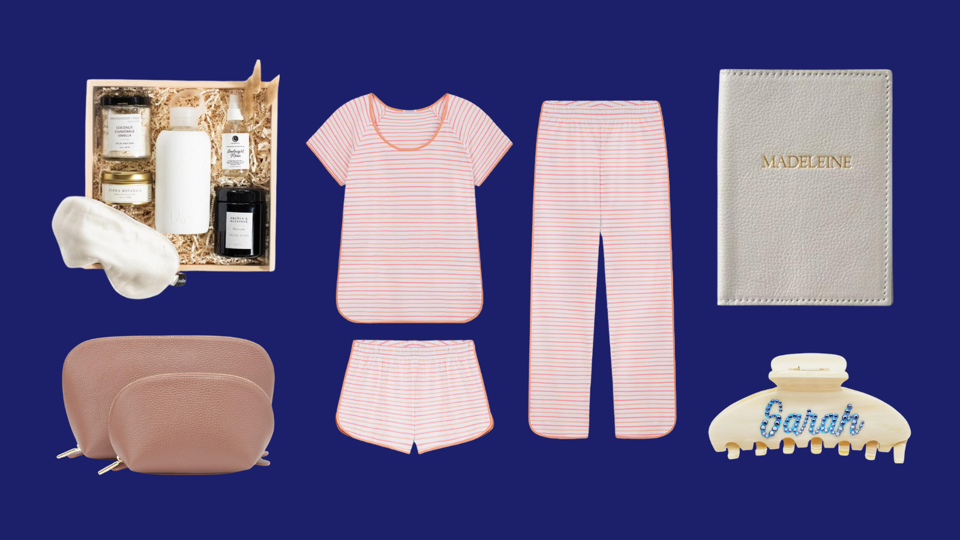 Cuyana case, Lake pajamas, Emi Jay clip, Mark & Graham passport holder on blue background