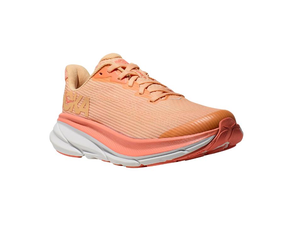 photo of right Hoka Kids Clifton 9 in peach/white on white background