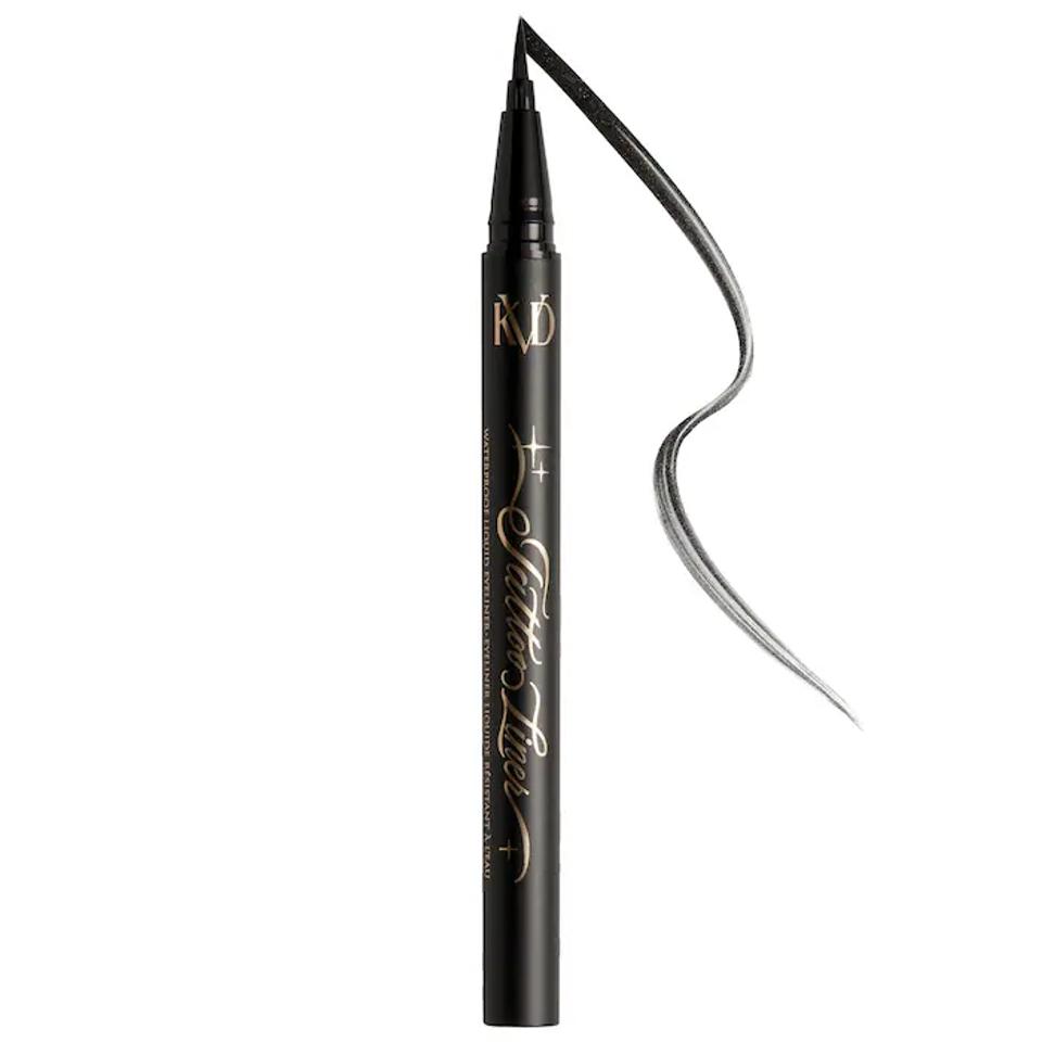 Black KVD Beauty Tattoo Liner drawing a line swatch on a white background