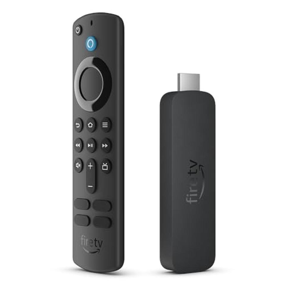 Amazon Fire TV Stick 4K streaming device and remote on a white background