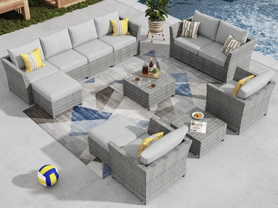 Sol 72 Outdoor Paulsen 8-Person Seating Group on a patio next to a pool