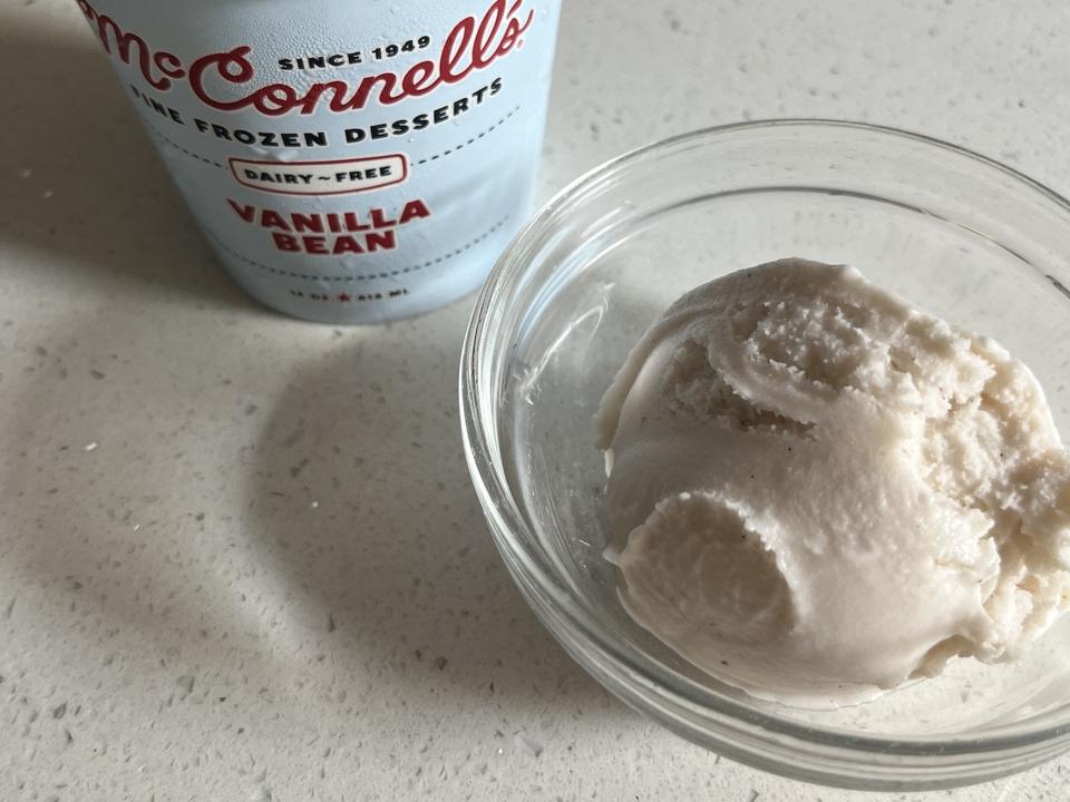 A scoop of McConnell's Dairy-Free Vanilla Bean.