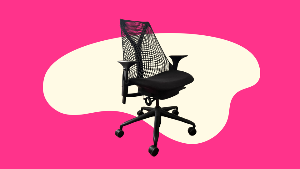 black herman miller sayl office chair original photo by anna perling on pink beige background