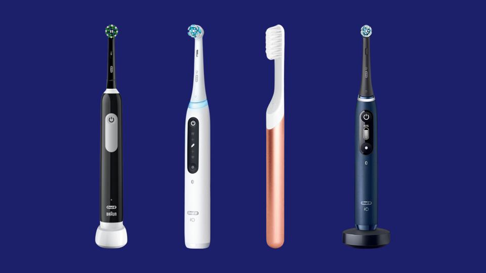 Four of the best electric toothbrushes against a dark blue background