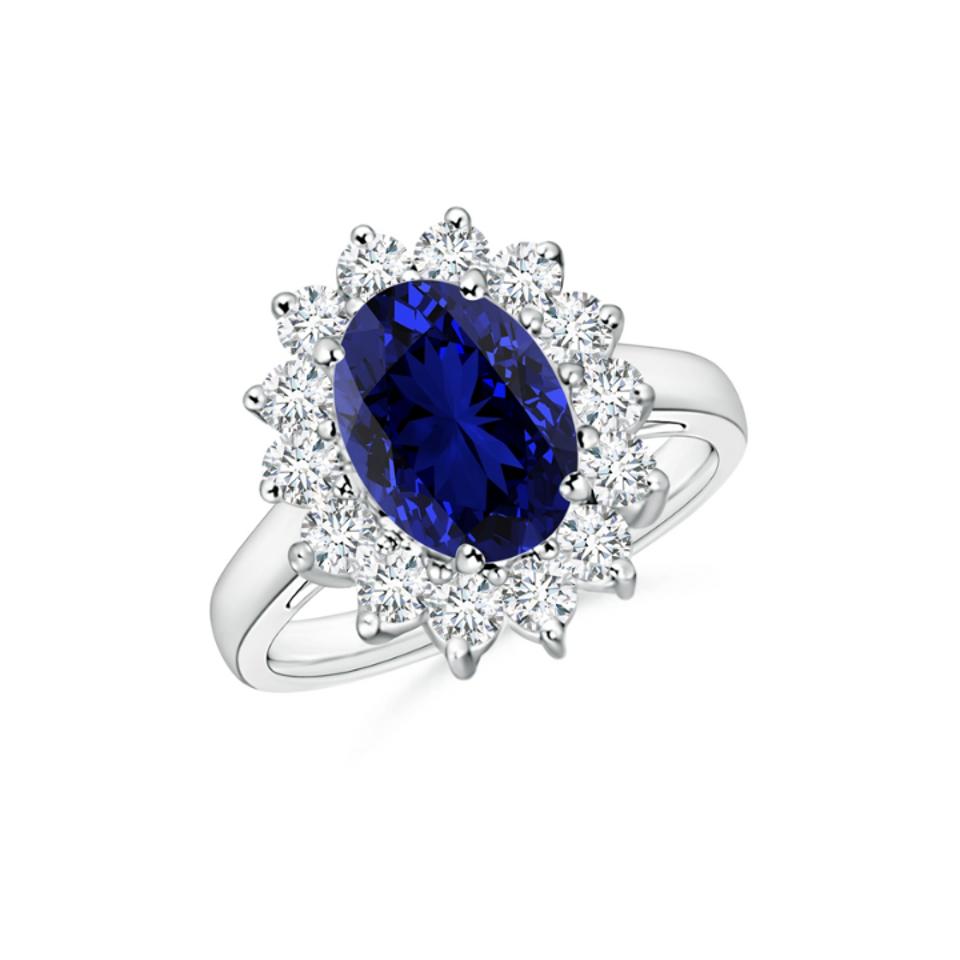 The Lab-Grown Princess Diana Inspired Blue Sapphire Ring against a white background. 