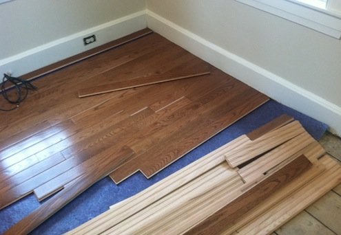 Installation de parquet préfini avec sous-couche Bellawood.